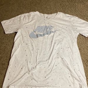 THE NIKE TEE Size large white with gray diamonds and Nike is reflective material